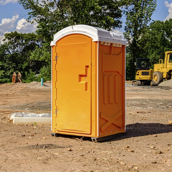 what is the cost difference between standard and deluxe porta potty rentals in Danese